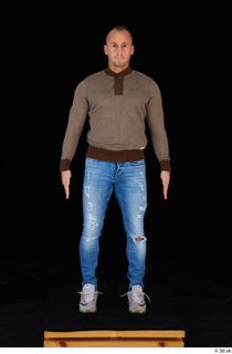 Arnost blue jeans brown sweatshirt clothing standing whole body 0001.jpg